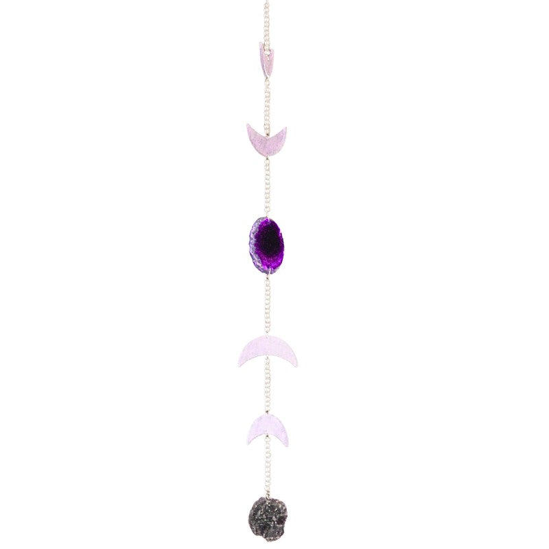 wall hanging with purple gemstone and moon phase pendants on a white background