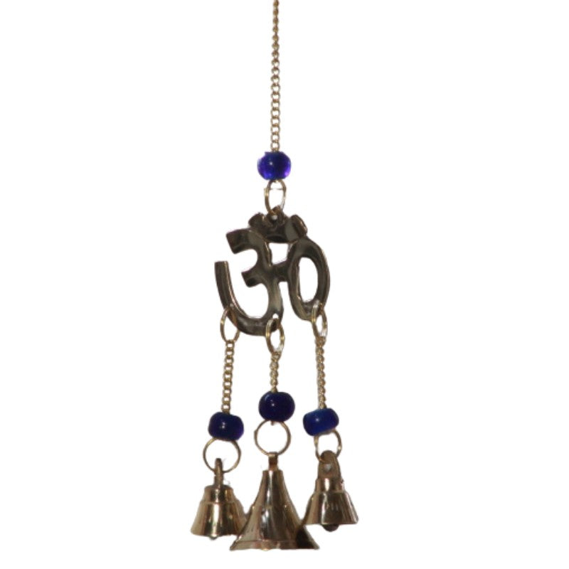 3 brass bells hanging from chains suspended from a brass aum symbol