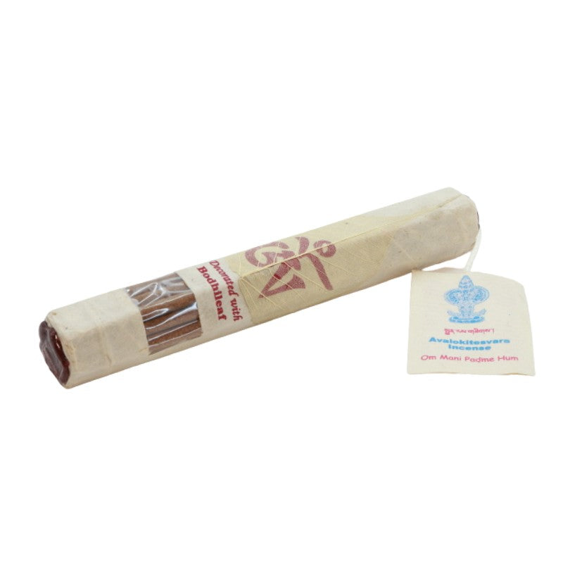 pack of handmade tibetan incense decorated with a coloured bodhi leaf