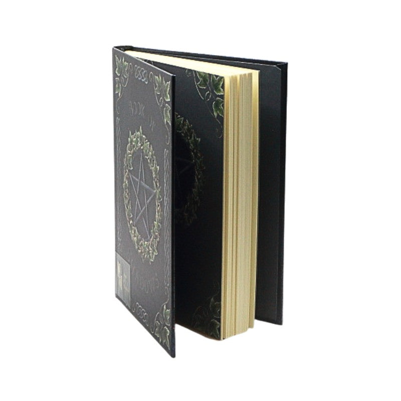 Black book with decorative cover design on a white background