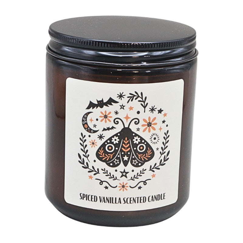 amber coloured jar with a white label with black and orange moth and floral design.