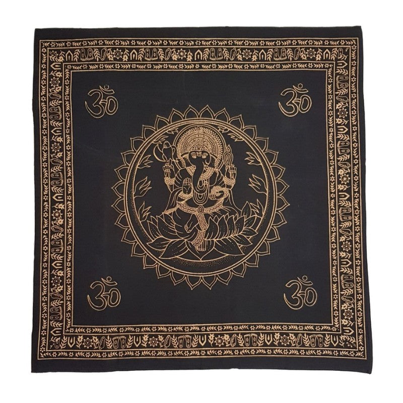 Black fabric with gold ganesh image and Om symbols on a white background
