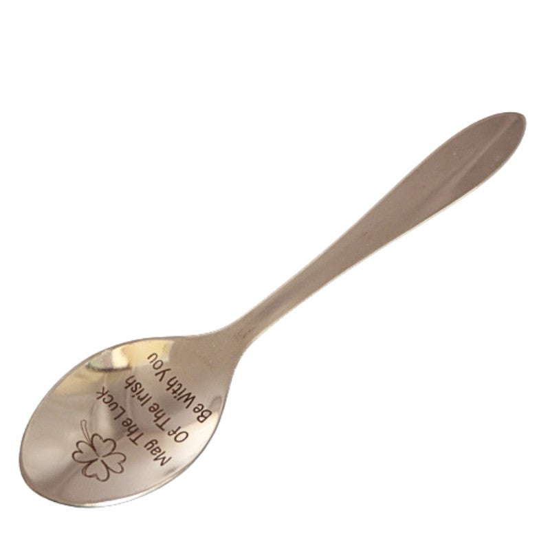 stainless steel teaspoon with "may the luck of the irish be with you" and a four leaf clover engraved in the dish