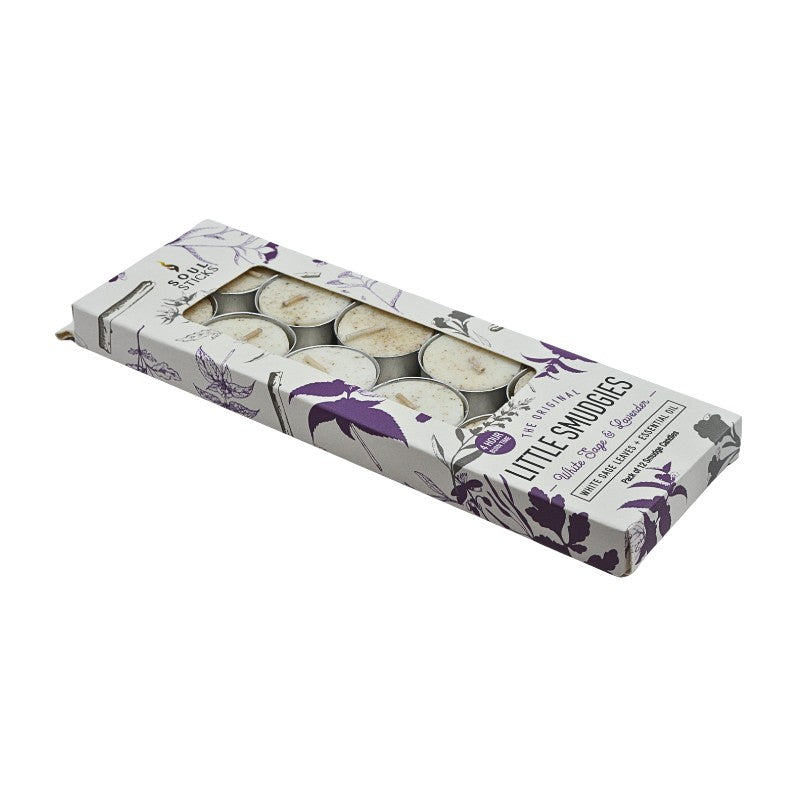 Box of tea light candles with floral design on a white background