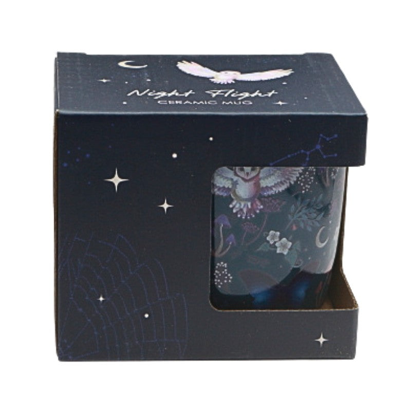 Ceramic mug with 'Night Flight' design in packaging