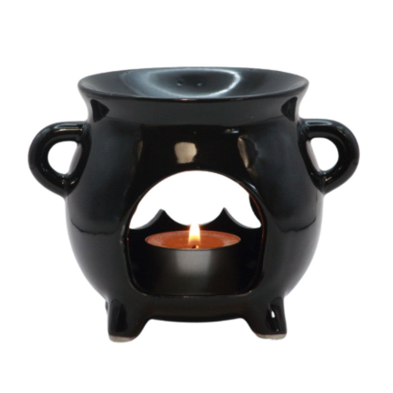 black ceramic cauldron oil burner with a triple moon shape cut out on the front