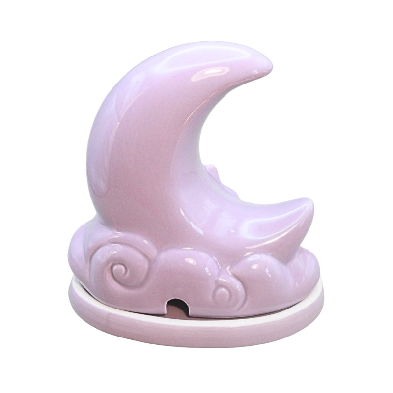 Purple ceramic moon shaped incense cone burner on a white background