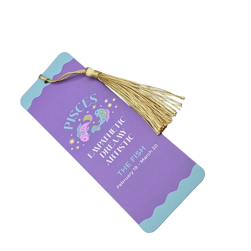 blue and purple bookmark with gold tassel and white and blue writing, on a white background