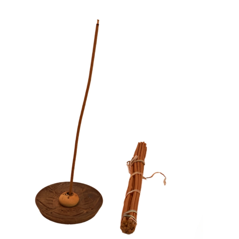 Round wooden carved incense holder- dark wood next to a bundle of hand rolled tibetan incense sticks