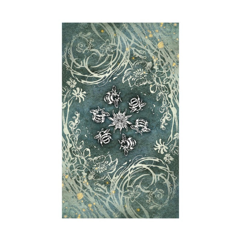back of verdance tarot card showing bee and floral pattern on a blue background