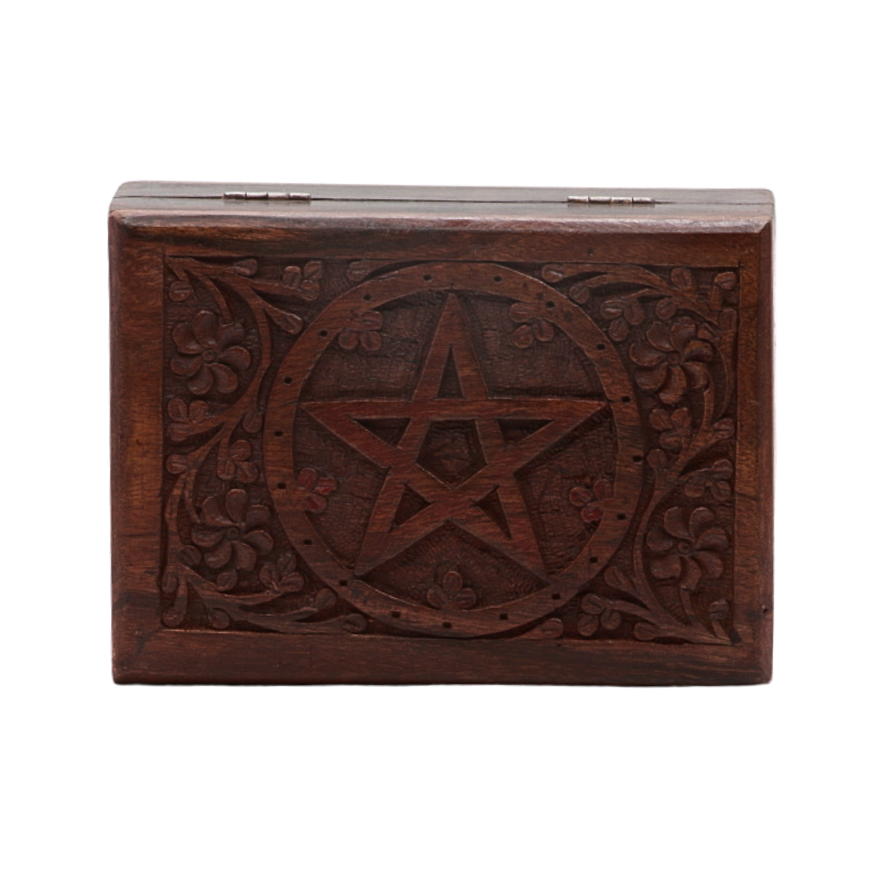 carved wooden box with pentacle design on top