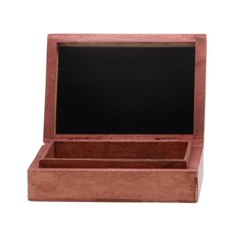 carved wooden box showing the inside