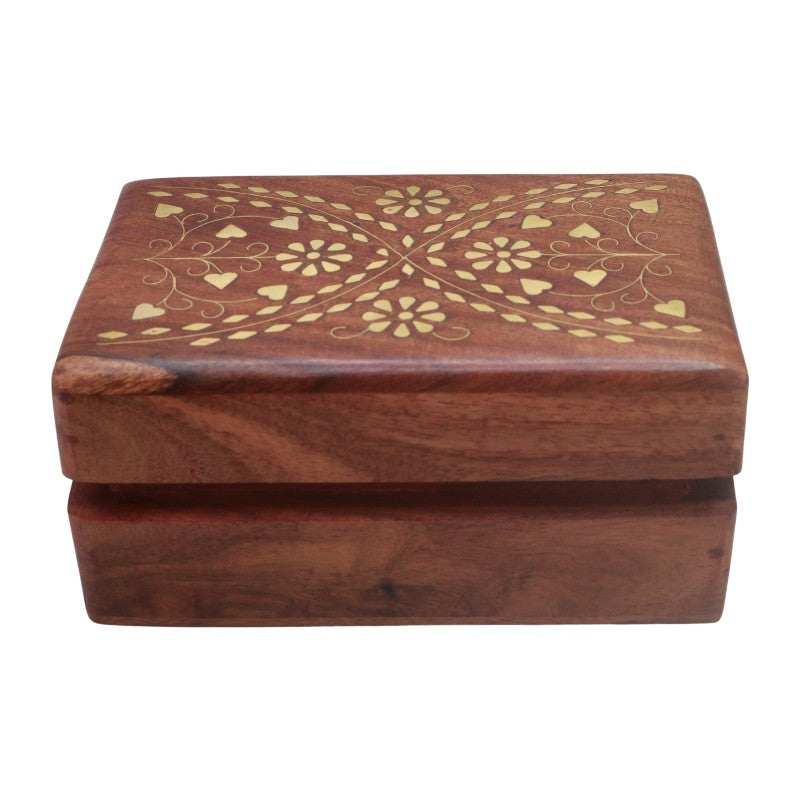 A rectangular wooden keepsake box with a hinged lid, featuring a warm reddish-brown wood grain and a gold-colored floral inlay pattern on the top surface, shown against a plain white background.
