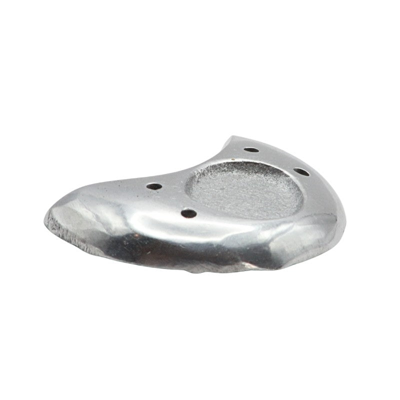 Metallic incense holder in a crescent moon shape on a white background