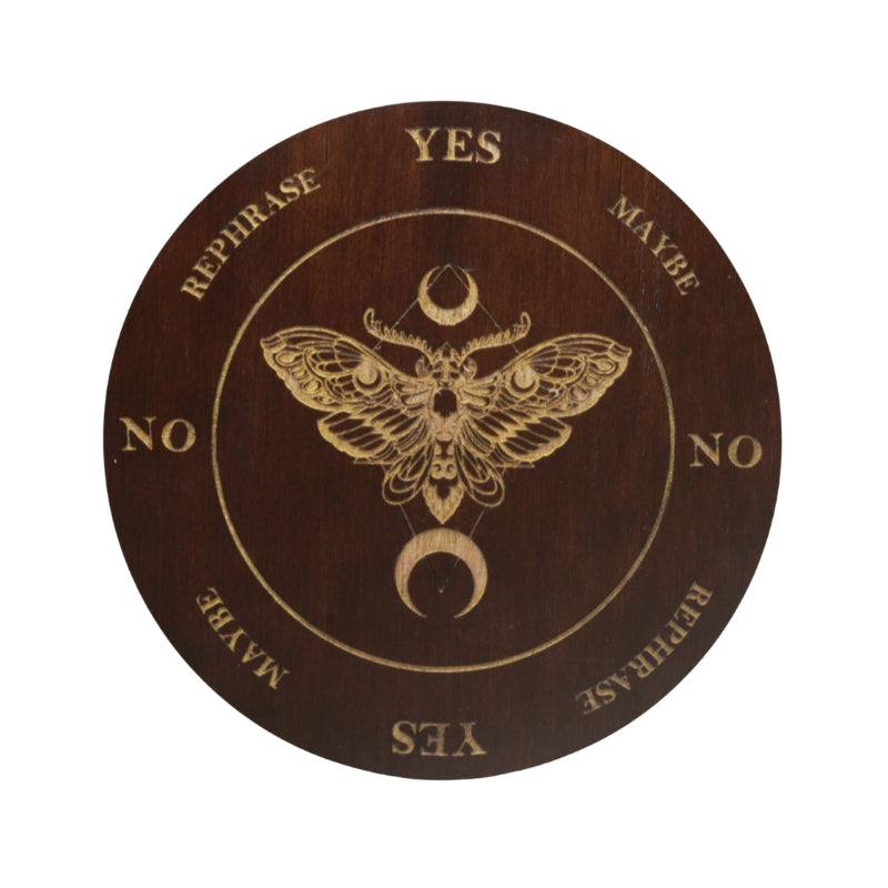 wooden circle board with a gold moth design and words surrounding the outside circle