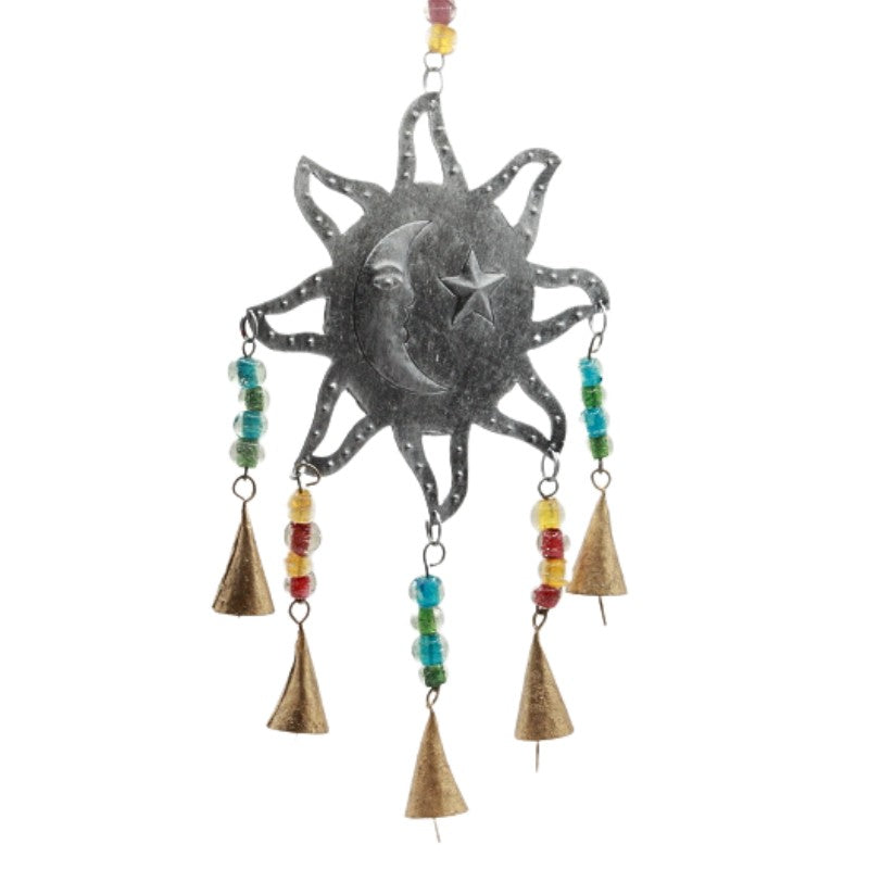 metal cut out of sun and moon with 5 bells hanging off it, suspended from beaded string