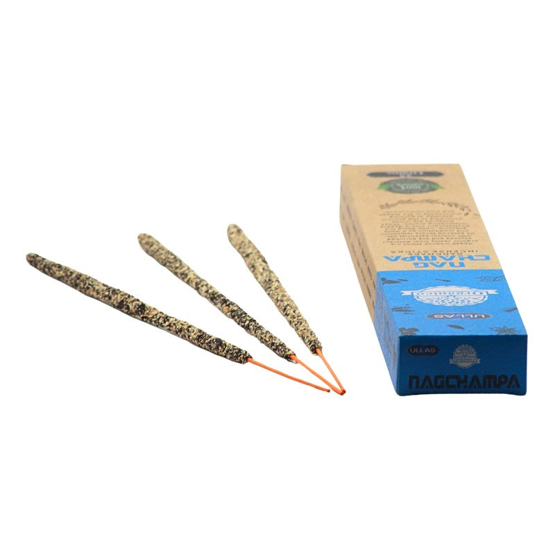 recycled cardboard box pack of incense next to 3 handmade incense sticks