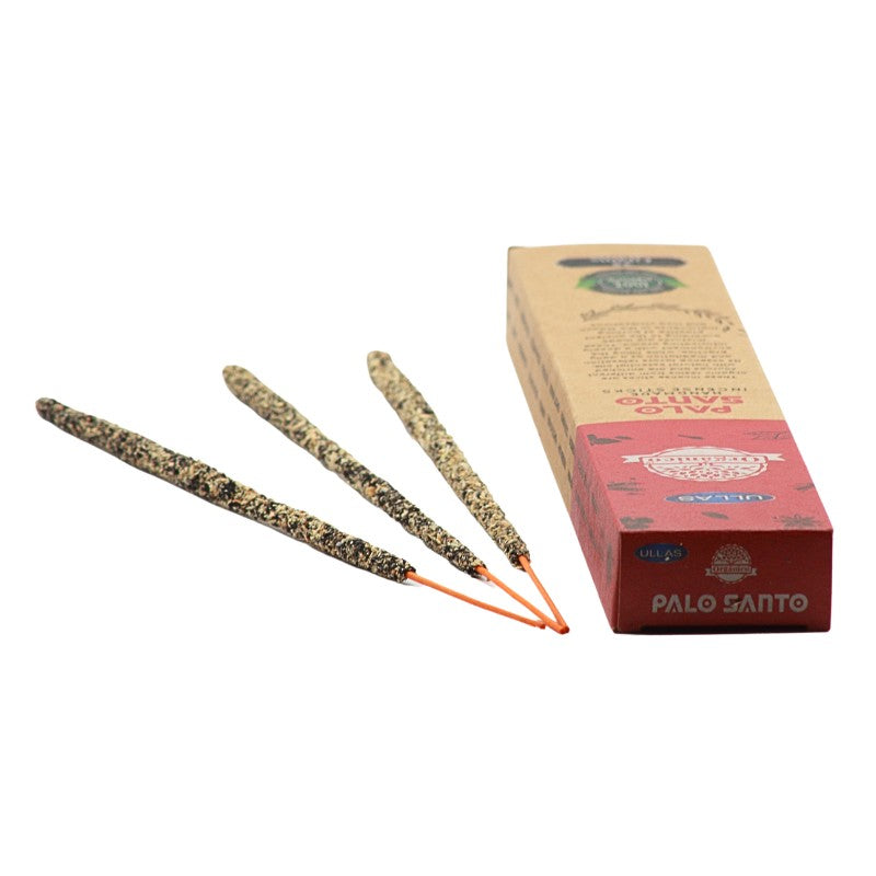 recycled cardboard box pack of incense next to 3 handmade incense sticks