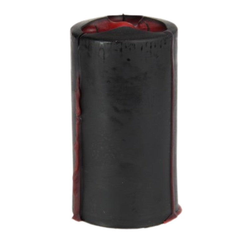 black pillar candle that bleeds red wax when lit