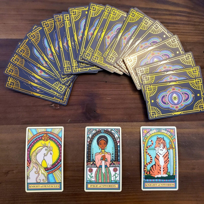 Wandering Star Tarot Cards fanned out with 3 cards showing