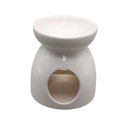 A white ceramic oil burner with a bowl-shaped top and a circular opening on the front base, shown against a plain white background.