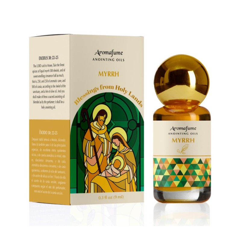 Bottle of anointing oil with colourful label next to packaging box