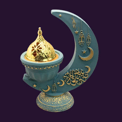 blue and gold incense burner in the shape of a crescent moon