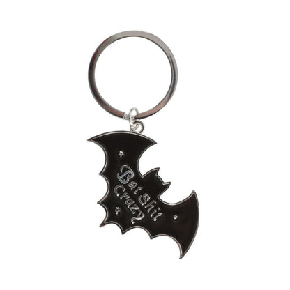 bat shaped black and silver keyring on a white background