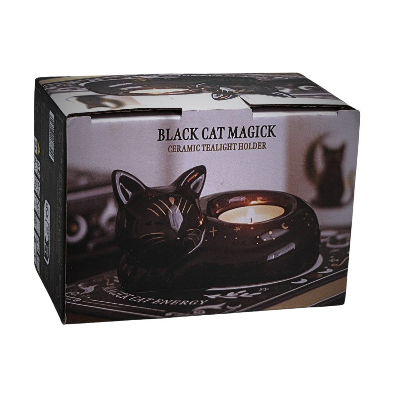 Black cat-themed ceramic tealight holder in packaging with 'Black Cat Magick' text.
