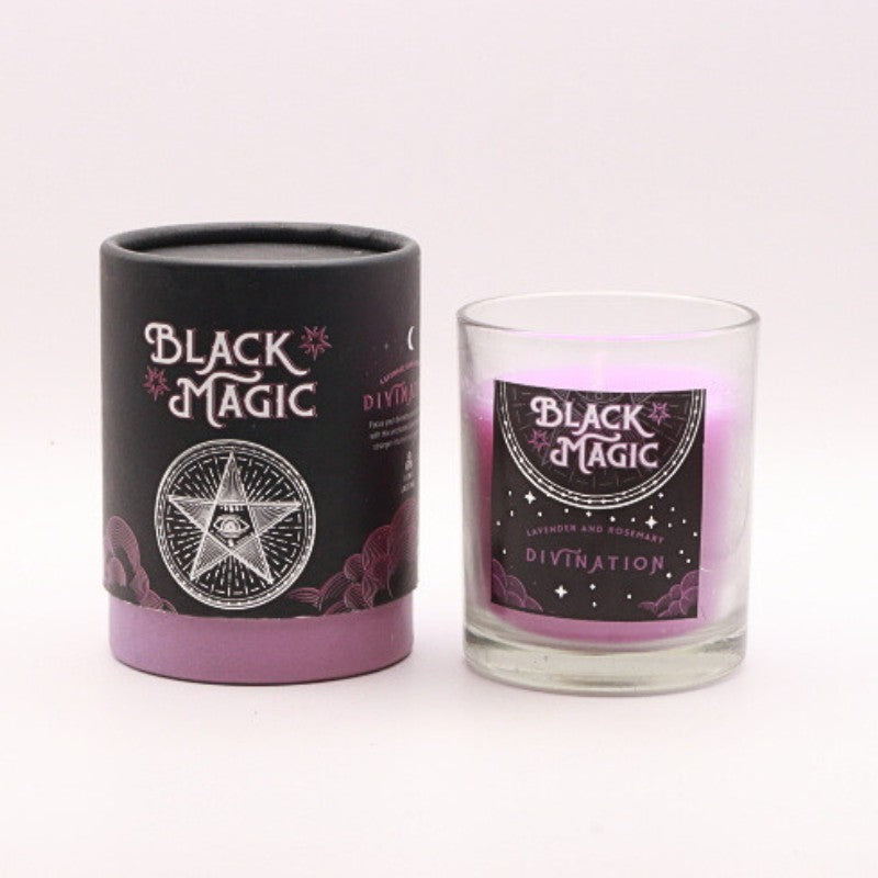 gift box next to a purple divination candle in a glass jar 