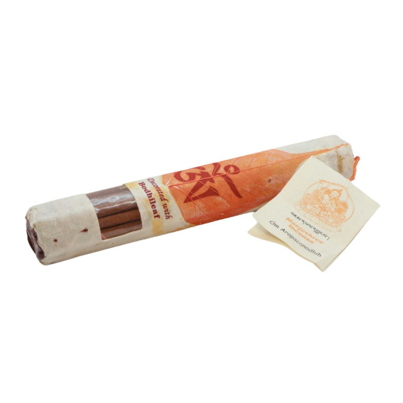 pack of handmade tibetan incense decorated with a coloured bodhi leaf 