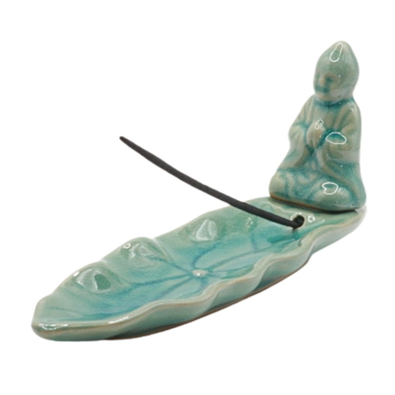 blue ceramic incense holder with incense stick