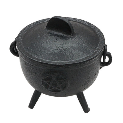 black cauldron with pentacle design on front
