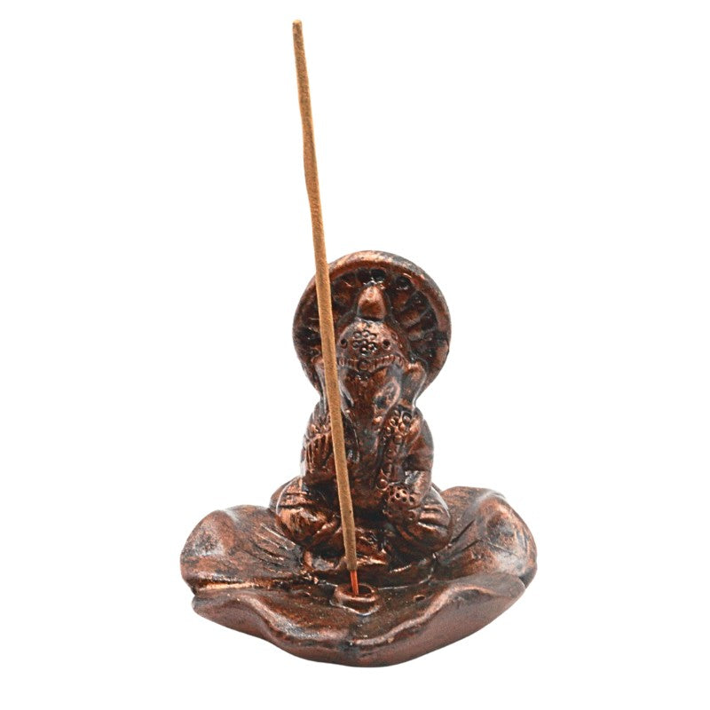 Clay incense burner with a single incense stick on a white background