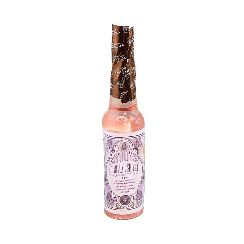 bottle of cleansing water with "spiritual shield" written on the label