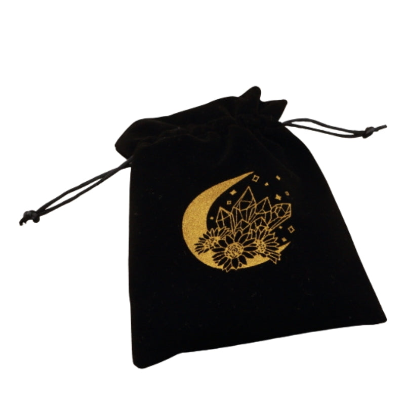 black tarot bag with gold print of a moon, crystals and flowers