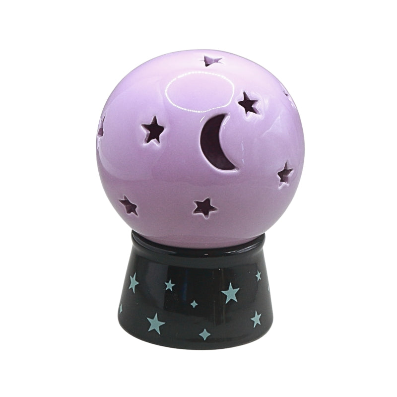 A purple crystal ball tea light candle holder with star and moon cutouts, resting on a black base decorated with light blue stars, set against a plain white background.