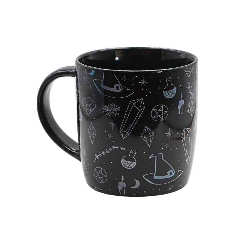 Black mug with witchy illustrations on a white background