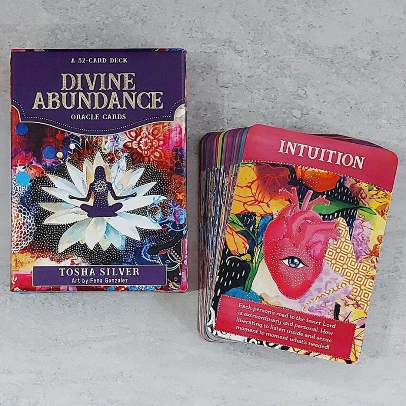 Divine abundance oracle cards- box and colourful cards stacked up