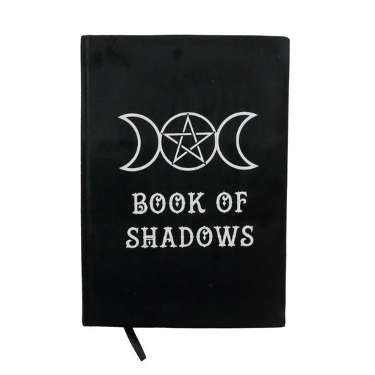 black velvet book of shadows journal with a white triple moon pentacle design on the cover