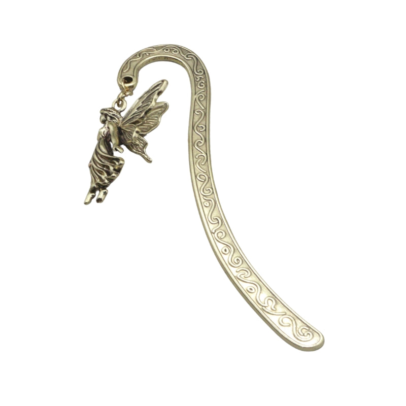 Gold metal bookmark with swirl decorations and a fairy charm at the top, on a white background