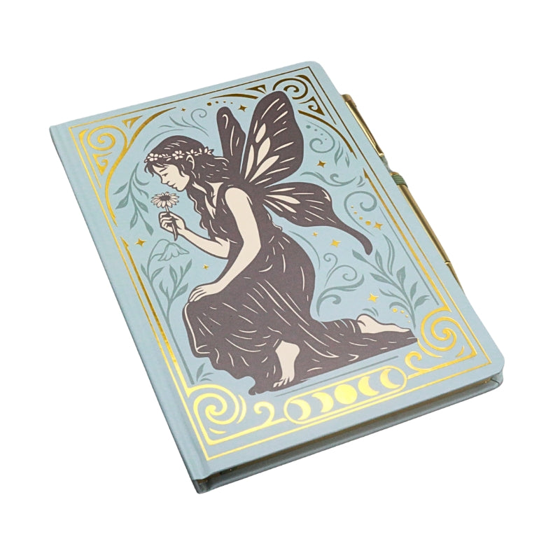 blue and gold notebook with a grey vintage style fairy on the cover, on a white background