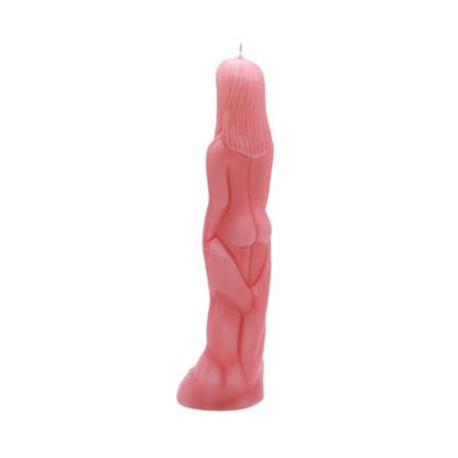 Pink candle shaped like a person on a white background