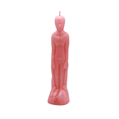 Pink candle shaped like a person on a white background