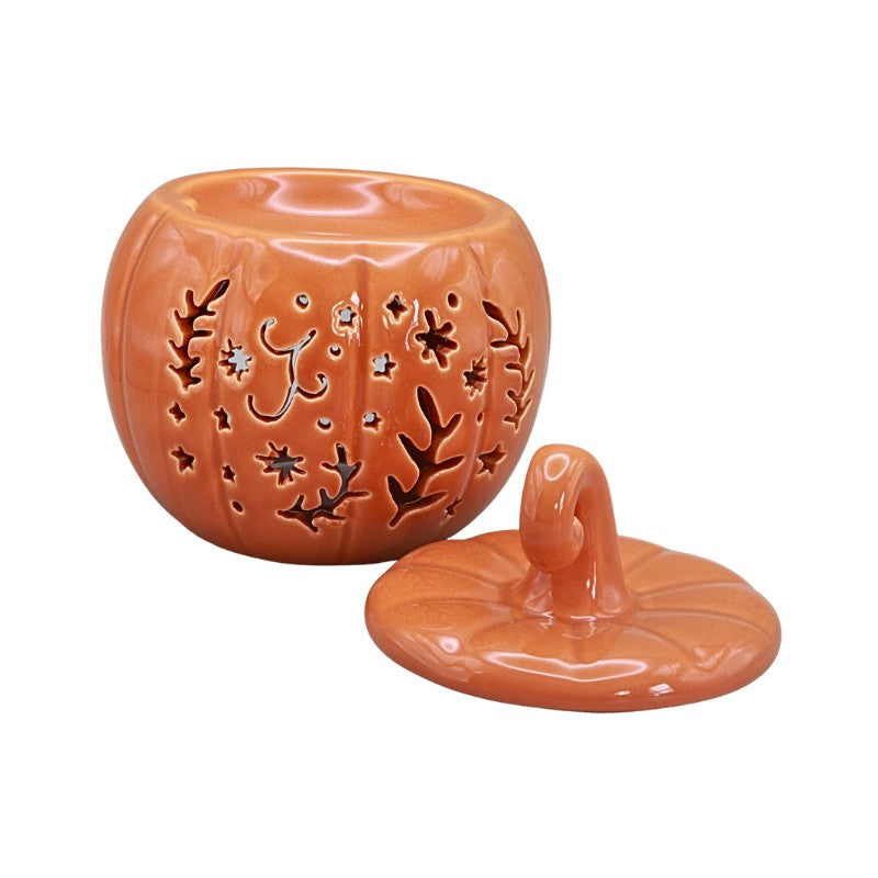 orange ceramic pumpkin on a white background