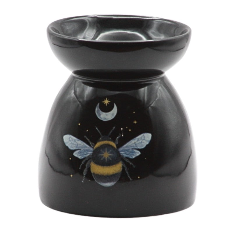 Black oil burner with a yellow and black bee and crescent moon and stars printed on it