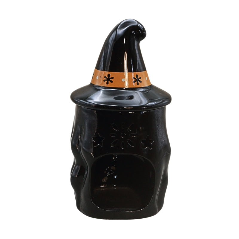 A glossy black witch hat cookie jar with a pointed hat, an orange band decorated with black stars, and a small coin slot on top, shown on a plain white background.
