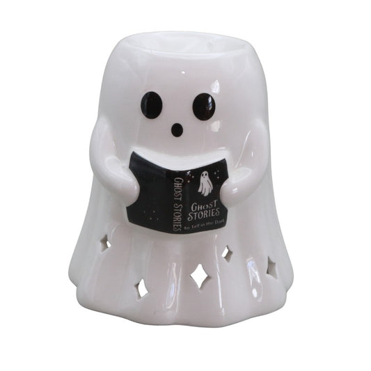White ghost-shaped oil burner with a book titled 'Ghost Stories' on a white background