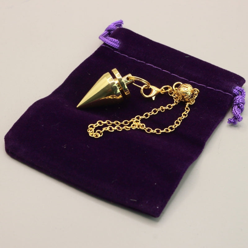 Gold  Pendulum on purple bag
