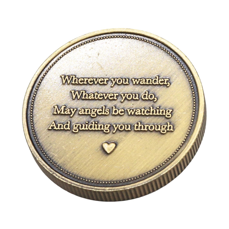 A round bronze-colored guardian angel protection coin with a quote and heart